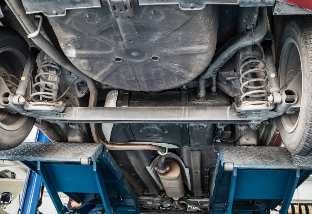 istock car on lifts in auto service centre for maintenance and tire replacement 950928382