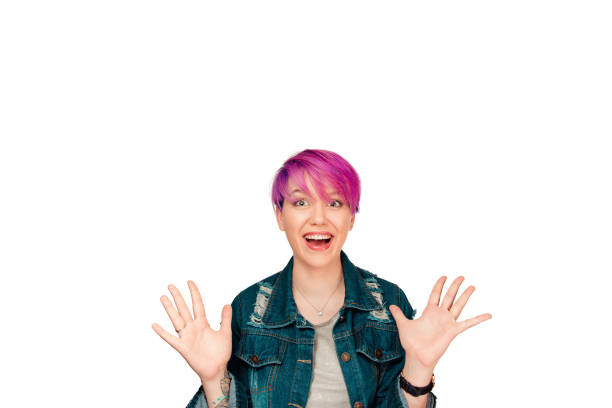 istock woman gestures with happiness, stares at camera happily 950933442