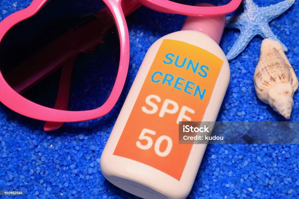 SUN SCREEN Beach Stock Photo
