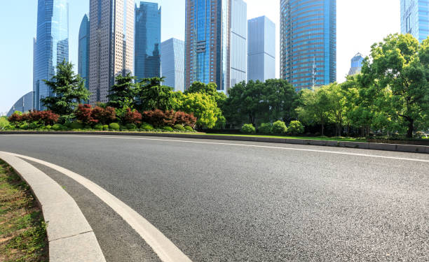istock asphalt road with city skyline background in shanghai 950953612