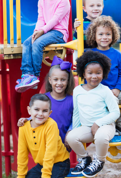 istock Multi-ethnic school children on playground 950956556