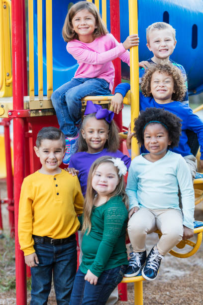 istock Multi-ethnic school children on playground 950957002