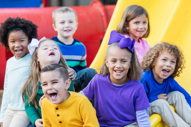 istock Multi-ethnic school children on playground 950957124