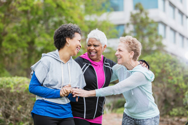 istock Three older multi-ethnic women hanging out together 950961366