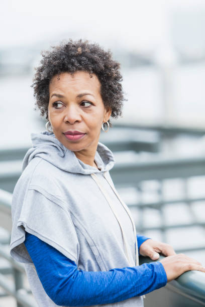 istock Mature African-American woman looking over shoulder 950961422