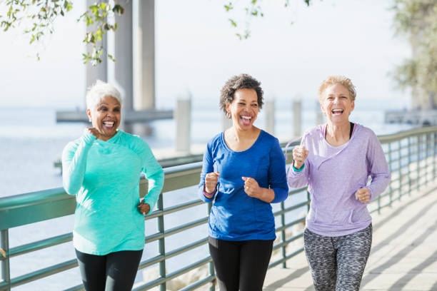 istock Three mature and senior women running on waterfront 950962076