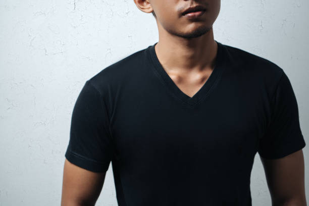 istock man in black blank t-shirt 950965558