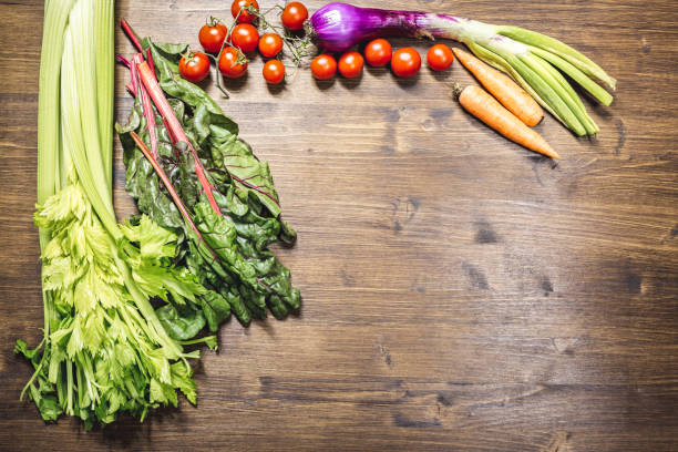 istock A mix of fresh vegetables on an old table ready to be cooked to taste 950969922