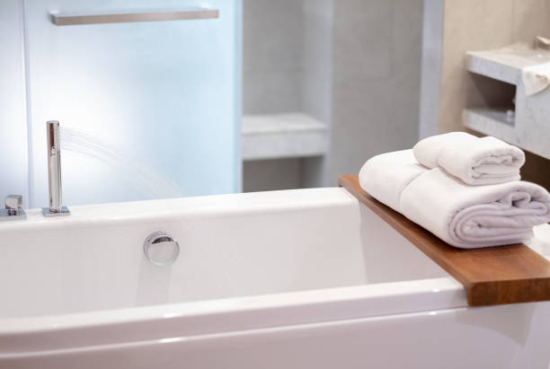 istock bathroom interior white spa towels copy space Shower with refreshing 950979478