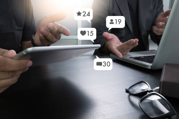 istock Contact us  sms media man use  smart phone social media network pop notification icons 950979508