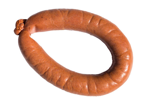 istock Smoked sausage isolated on white background 950981888