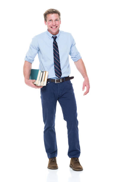 istock Handsome well dressed man is holding books 950986682