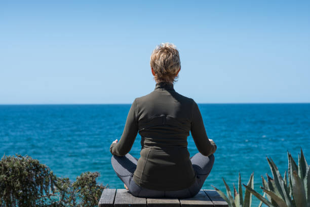 istock Woman Doing Yoga at a Resort 950987760