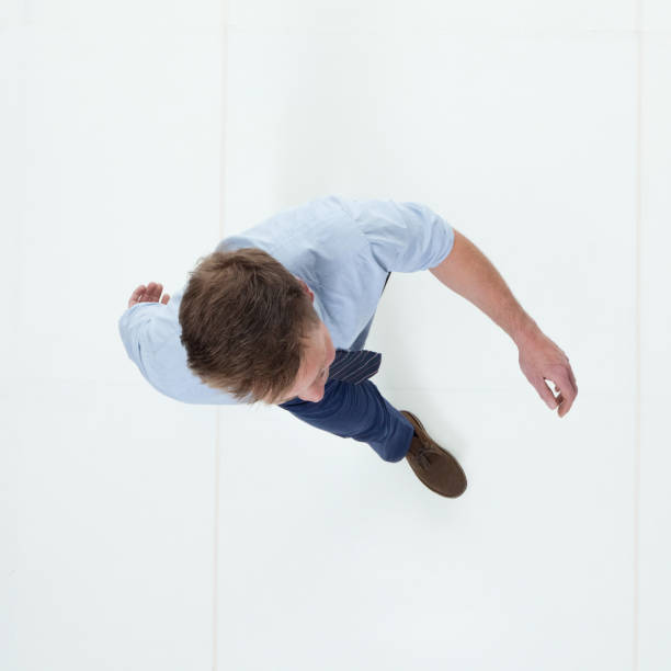 istock Beautiful businessman walking 950990686