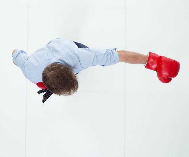 istock Beautiful businessman is boxing 950991222