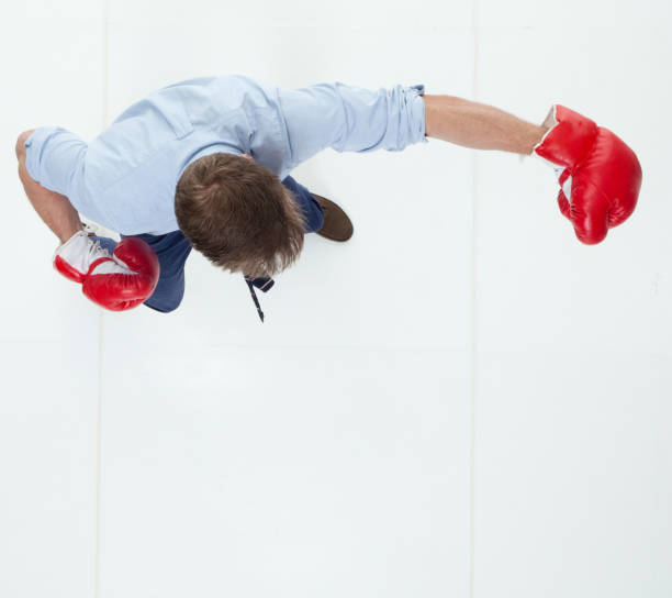 istock Beautiful businessman is boxing 950991318