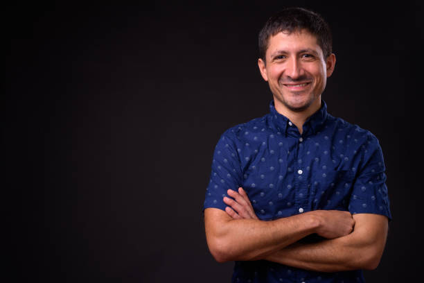 istock Portrait Of Happy Hispanic Man Smiling 950991534