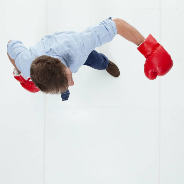 istock Beautiful businessman is boxing 950991572