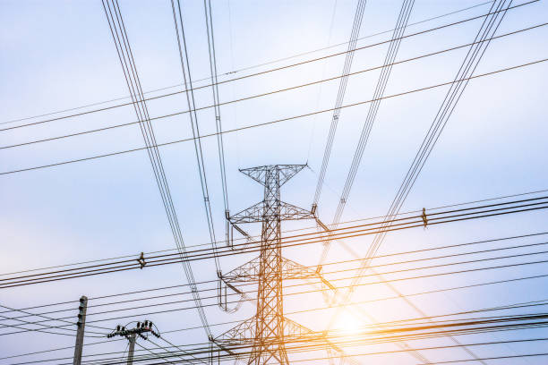 istock Electricity concept. Close up high voltage power lines station. 950992258