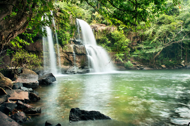 istock waterfall in thai national park. In the deep forest on mountain. 950992616