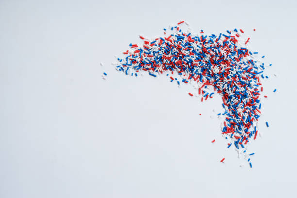 istock Sugar sprinkle dots in blue, white and red colors 950994844