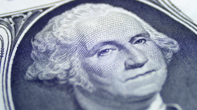 Slow Rotating George Washington Portrait on One Dollar Bill