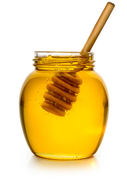 honey  - syrup jar sticky isolated objects stock-fotos und bilder