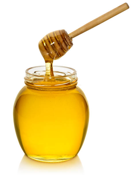 honey  - syrup jar sticky isolated objects stock-fotos und bilder