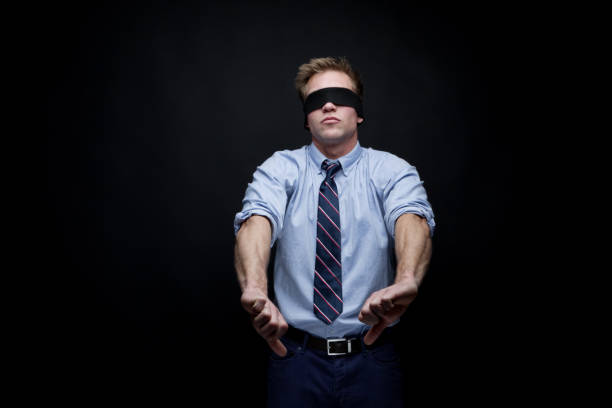 istock Handsome young male thumbs down 950995968