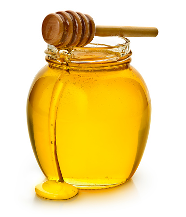 A jar of honey with a honey dipper. 
Insert your own label or logo. 
Isolated on a white background.