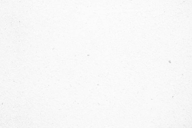 istock White Raw Concrete Wall Texture Background Suitable for Presentation and Web Templates with Space for Text. 951000068