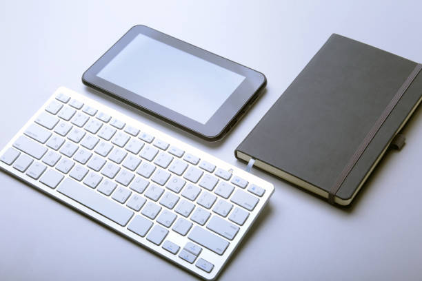 istock Corporate business desktop with laptop, digital tablet, accessories and work equipment. selective focus. 951000910