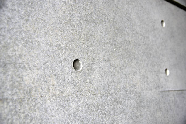 Concrete finishing wall Japanese architecture: Concrete finishing wall leaving formtie holes as a design concrete in formwork stock pictures, royalty-free photos & images