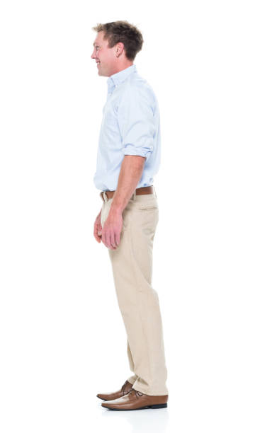 istock Attractive young male with hands by side 951006228