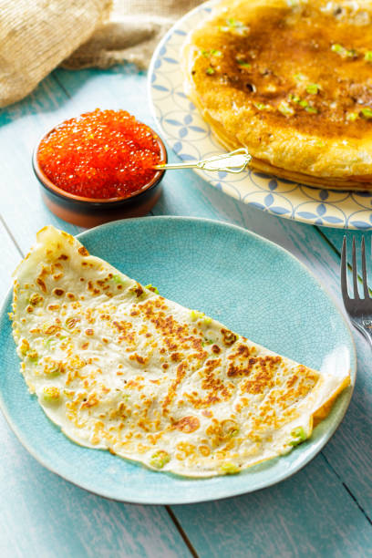 istock Lush pancakes with baked onions. Russian kitchen 951006998