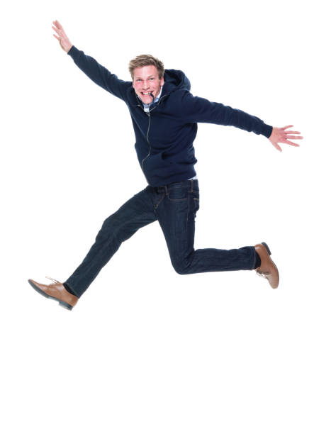 istock Attractive young male jumping 951010442