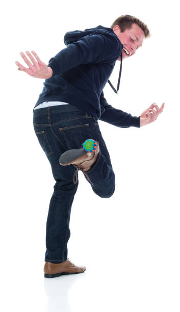 istock Attractive young male using foot bag 951010760