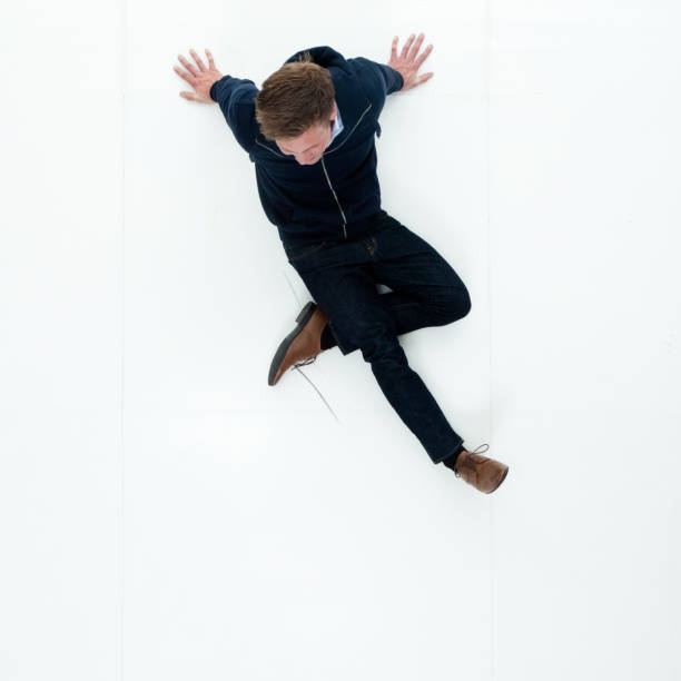 istock Man in hooded jacket sitting 951018600