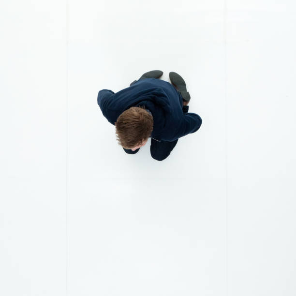 istock Man in hooded jacket sitting 951018608