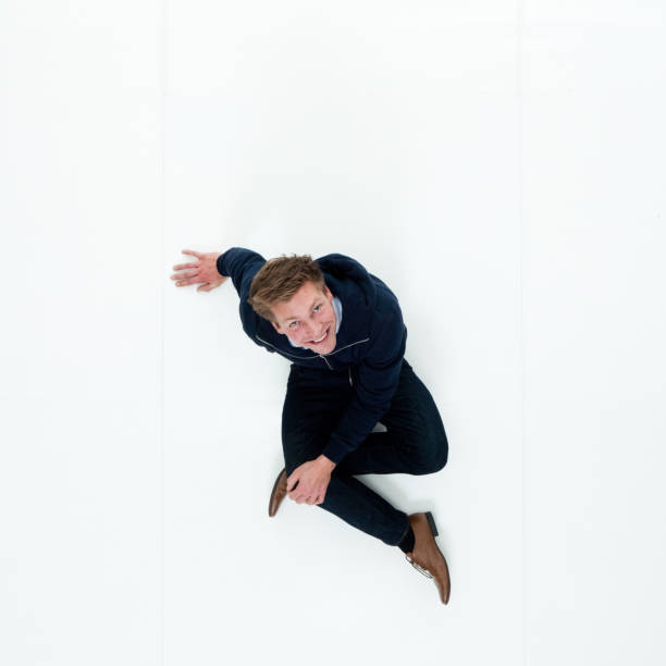 istock Man in hooded jacket sitting 951018644