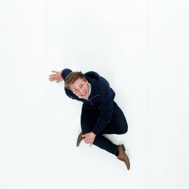 istock Man in hooded jacket sitting 951018666
