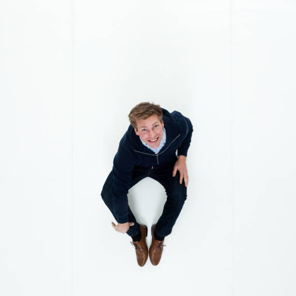 istock Man in hooded jacket sitting 951018832