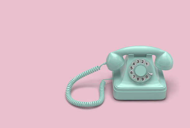 istock Mint green rotary telephone on pink background 951022312