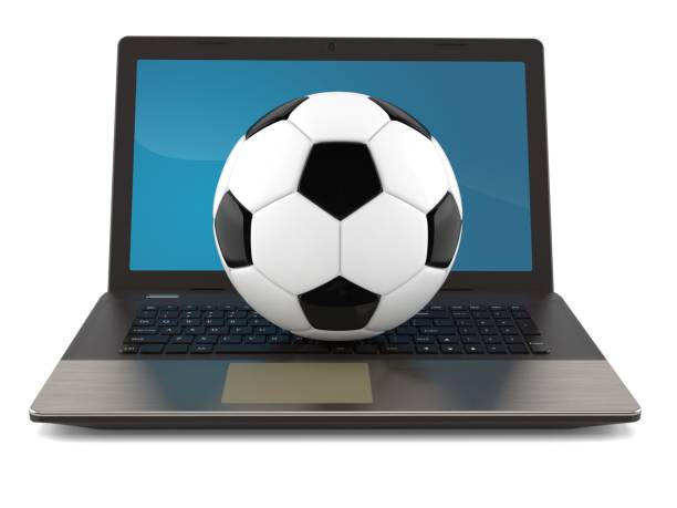istock Soccer ball with laptop 951022896