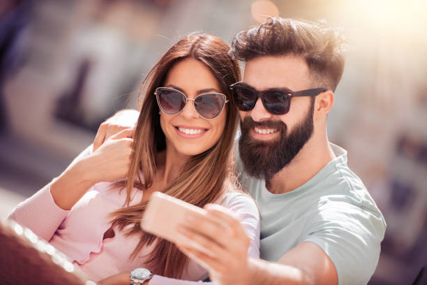 istock Happy young couple having fun outdoors and smiling 951023126