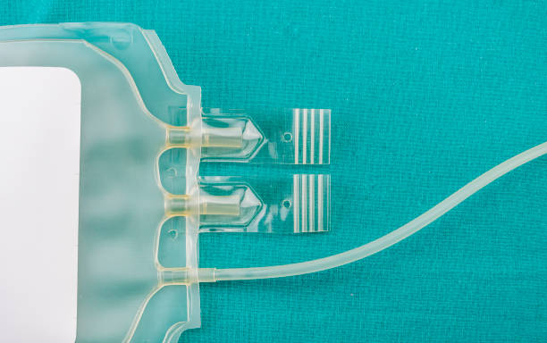 istock Empty blood bags at a hospital table, conceptual image 951023712