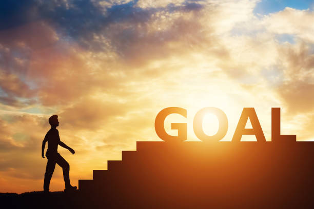 istock Man standing in front of stairs with 