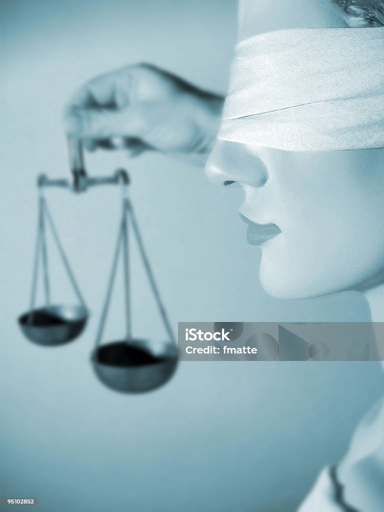 Representation of Lady Justice with blue filter Lady Justice Statue Adult Stock Photo