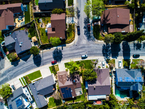 istock Buildings are lining along the road where nature exists. 951033770