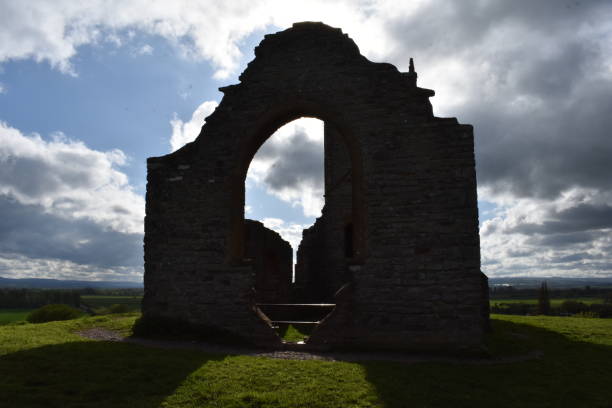 Burrow Mump arch dramatic close-up Abandoned church on a small hill in the Somerset levels burrow somerset stock pictures, royalty-free photos & images